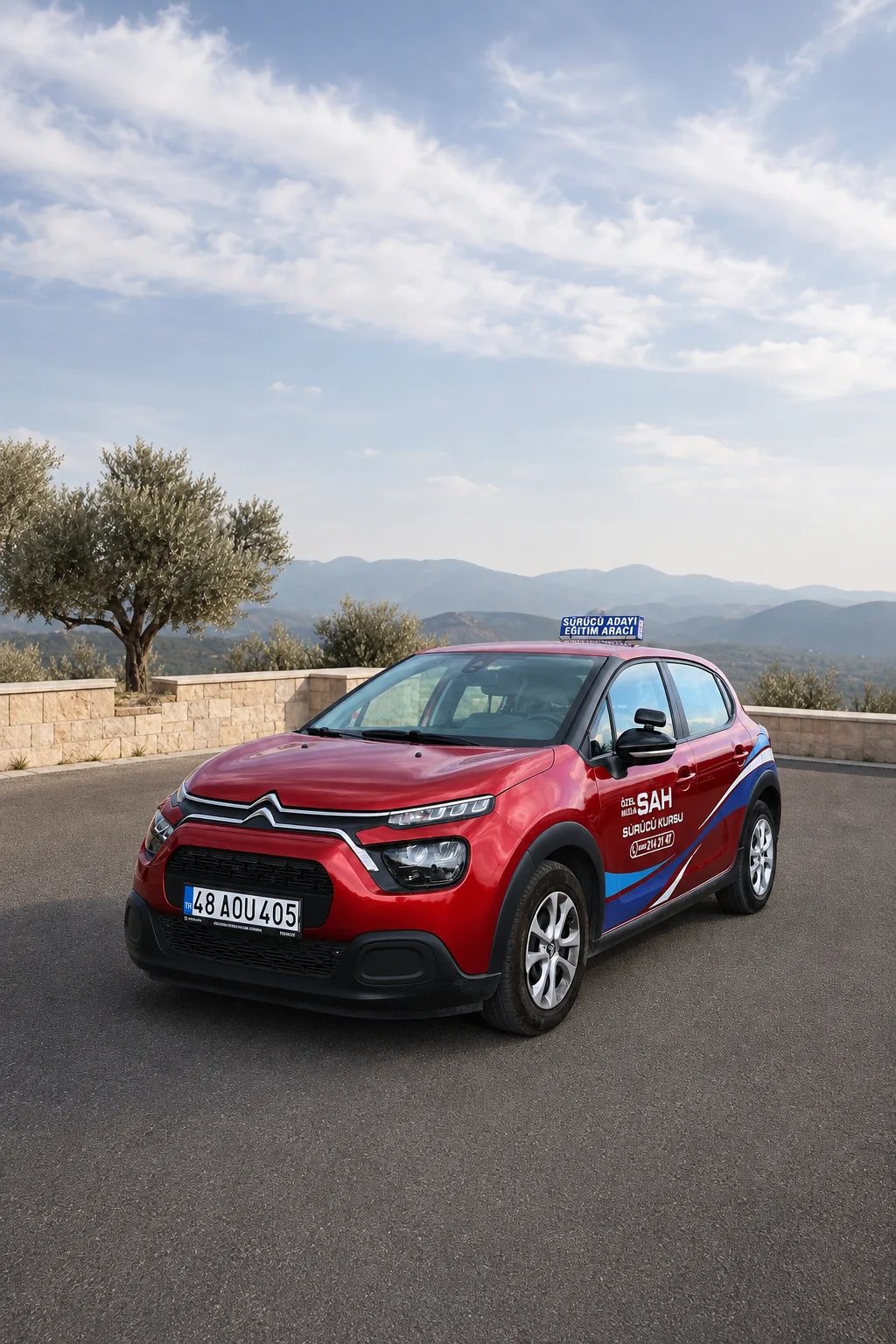 Şah Sürücü Kursu kırmızı Citroen direksiyon eğitim aracı