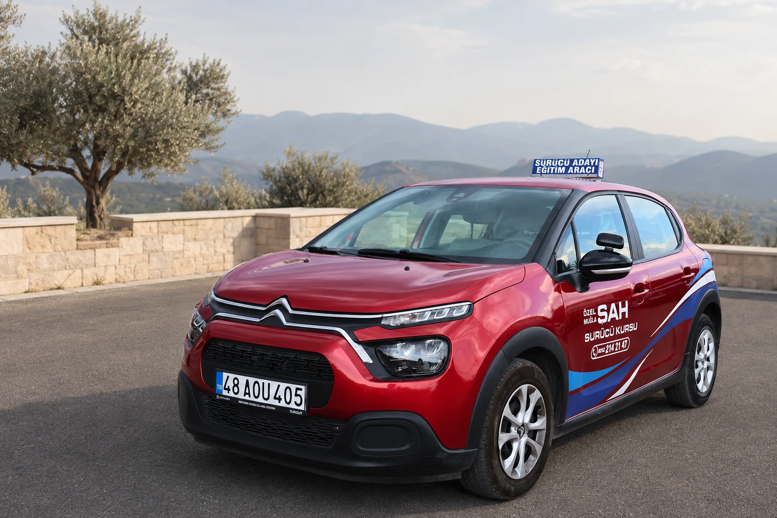 Şah Sürücü Kursu kırmızı Citroen direksiyon eğitim aracı